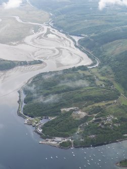 General oblique aerial view looking across Crinan village along the Crinan canal, taken from the NW.