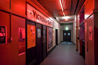 View of corridor and entrance doors to Vic Cafe Bar within Student Union building