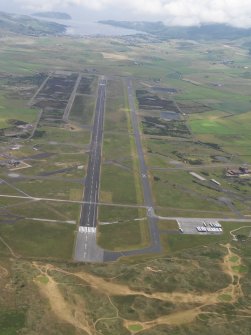 General oblique aerial view of Campbeltown airport, Machrihanish, taken from the WNW.