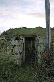 Detailed view of the entrance door to the North-Eastern elevation (principle) of the thatched cottage at Kilkenneth, Tiree, taken from the North-East.