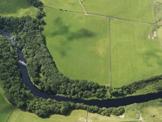 Oblique aerial view of the grassmarks of the Roman fortlet, taken from the NNE.