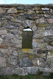 Detailed view of an arched window opening at Kirkapol Old Parish Church and Churchyard, Tiree.