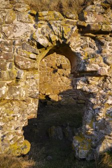 Detailed view of the arched opening to the Western end of the South elevation of Kirkapol Chapel, Tiree, taken from the South.