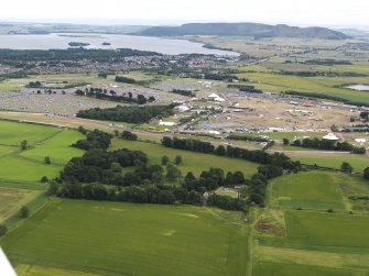 General oblique aerial view of T in the Park with Loch Leven beyond, looking to the ESE.