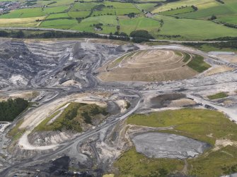 Oblique aerial view of the construction works for the Scotloch landscape sculpture in the St Ninian's opencast mine, looking to the E.
