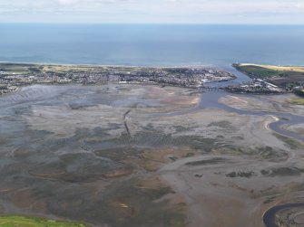 Oblique aerial view of the Montrose Basin at low tide centred on Dronner's Dyke, looking to the E.