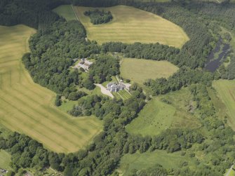Oblique aerial view of Crimonmogate House, looking to the NW.