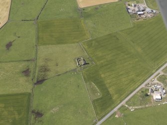 Oblique aerial view of Inverallochy Castle, looking to the W.