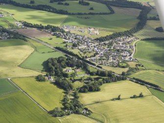 General oblique aerial view of Auldearn, looking to the SE.