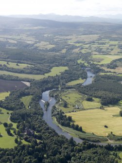 General oblique aerial view of Beaufort Castle and grounds with the River Beauly byond, looking to the W.