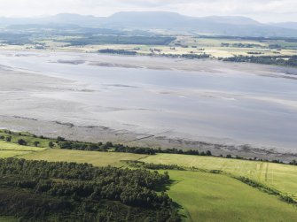 General oblique aerial view of the fish trap on the S bank of the Beauly Firth, looking to the NNW.