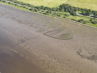 Oblique aerial view of the fish trap, looking to the SE.