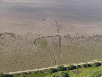 Oblique aerial view of the fish trap, looking to the N.