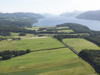 General oblique aerial view of the Great Glen and the north end of Loch Ness with Strath Dores in the foreground, looking to the SW.
