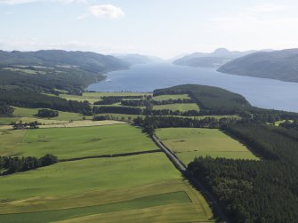 General oblique aerial view of the Great Glen and the north end of Loch Ness with Strath Dores in the foreground, looking to the SW.