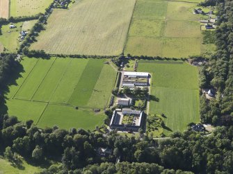 Oblique aerial view of Cantray Home Farm, looking to the NW.