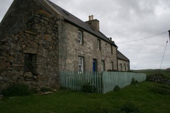 View from the SE of the house attached to the N end of the building.