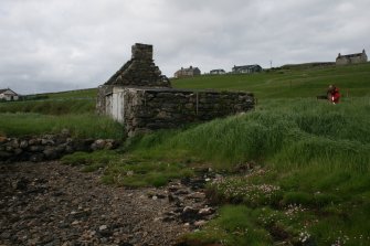 View from NE. Mr J Sherriff (RCAHMS) in picture.