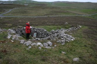 View from NE. Mr J Sherriff (RCAHMS) in picture.