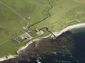 Oblique aerial view centred on Freswick Castle, taken from the ESE.