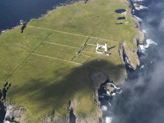 Oblique aerial view of the Muckle Skerry lighthouse, taken from the ENE.