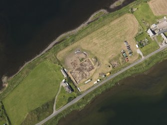 Oblique aerial view of the excavations at the Ness of Brodgar, taken from the ENE.