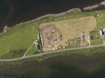 Oblique aerial view of the excavations at the Ness of Brodgar, taken from the NE.