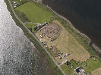 Oblique aerial view of the excavations at the Ness of Brodgar, taken from the NNW.
