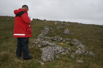 View from NNW. Mr J Sherriff (RCAHMS) in picture.