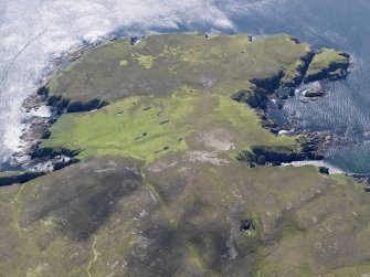 Oblique aerial view of the remains of the township on Eilean nan Ron, taken from the NNW.