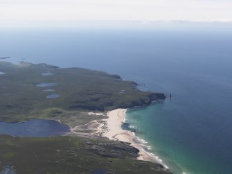General oblique aerial view of Sandwood Bay with Rubh' a Bhuachaille beyond and the Western Isles in the distance, taken from the NE.