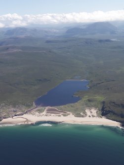 General oblique aerial view of Sandwood Bay and the Loch with Foinaven beyond, taken from the NE.