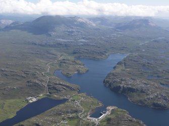 General oblique aerial view of Kinlochbervie with Loch Inchard and Foinaven beyond, taken from the NW.