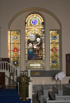 Interior. Ground floor, E wall, view of stained glass window