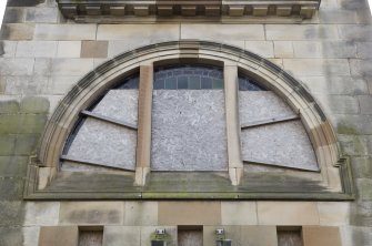 Main entrance diocletian window. Detail