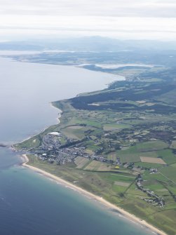 General oblique aerial view of the Sutherland coast with Brora in the foreground and Loch Fleet in the distance, looking NW.