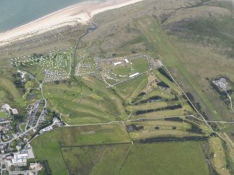 Oblique aerial view of Royal Dornoch golf course and airfield, looking ESE.
