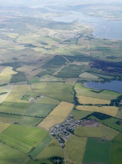 General oblique aerial view of Hill of Fearn with Loch Eye, Tain and the Dornoch Firth beyond, looking NNW.