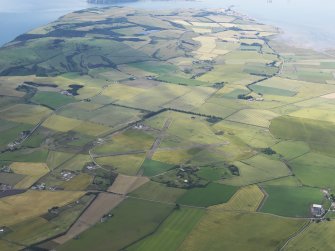 General oblique aerial view of Fearn Airfield, looking SSW.