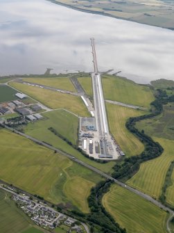 Oblique aerial view of Evanton Airfield and the quay, looking E.