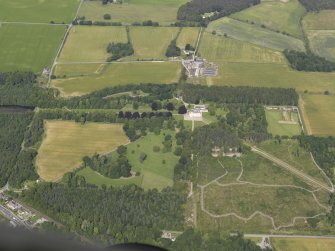 Oblique aerial view of Brodies Castle and gardens, looking NW.