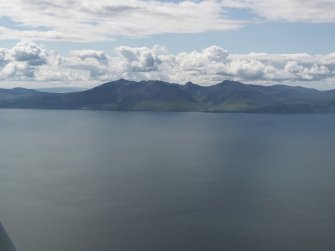 General oblique aerial view of Arran from across the Firth of Clyde, looking to the W.