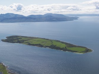 General oblique aerial view of Arran with Inchmarnock in the foreground, looking to the WSW.