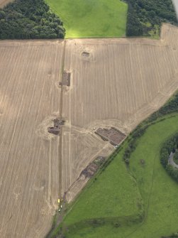 General oblique aerial view of the 2010 excavations at Forteviot, taken from the NNW.