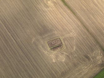 General oblique aerial view of the 2010 excavations of the square barrows at Forteviot, taken from the SSE.