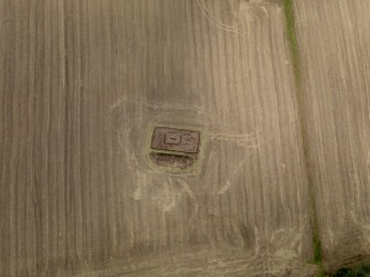General oblique aerial view of the 2010 excavations of the square barrows at Forteviot, taken from the SE.