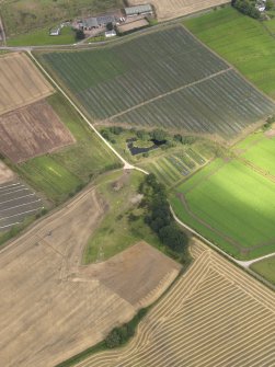 Oblique aerial view of Castle of Rattray quarry, taken from the S.