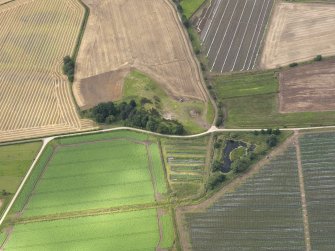 Oblique aerial view of Castle of Rattray quarry, taken from the ENE.