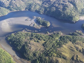 Oblique aerial view of Eilean an Fhaidh in Loch Moidart, looking S.