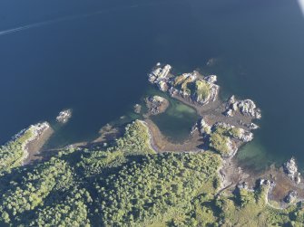 Oblique aerial view of Dun Ghallain, looking SSE.